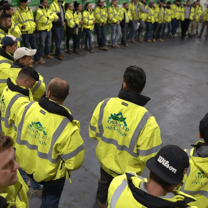 Advanced Green Insulation team forming a circle